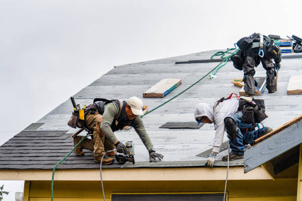 Professional Roofing technician working in Millville, MA